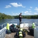 Bob pulling up the anchor on the pontoon